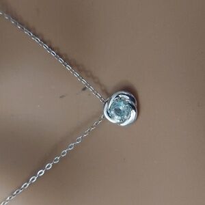 Nadri Light Blue Topaz Round Pendant Sterling Silver Necklace
